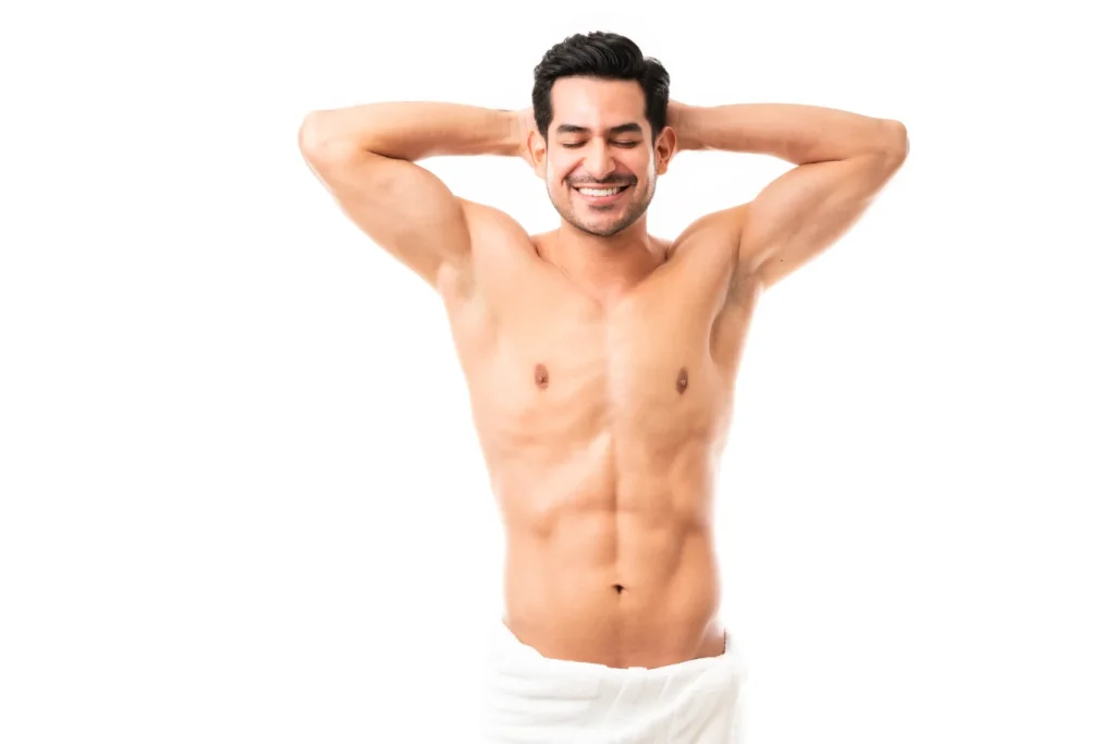 man at a clinic recieving laser hair removal treatment